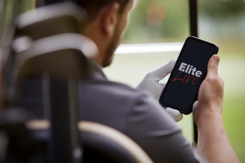 man downloading ESP app at golf course in bristol