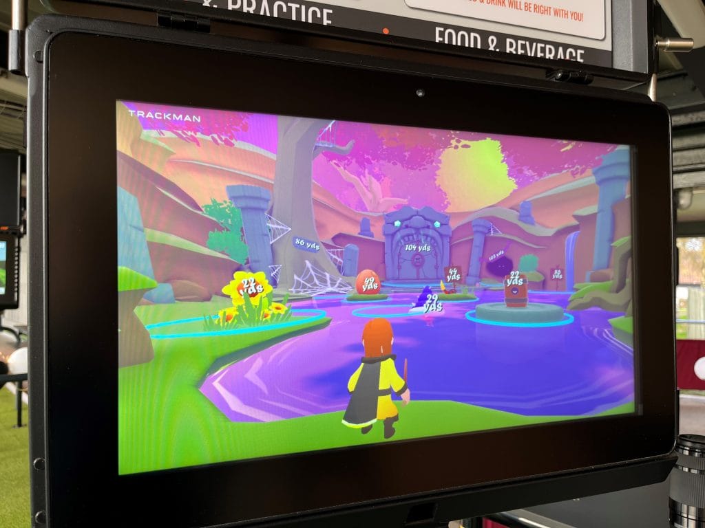 fun interactive game for young golfers at trackman driving range in bristol